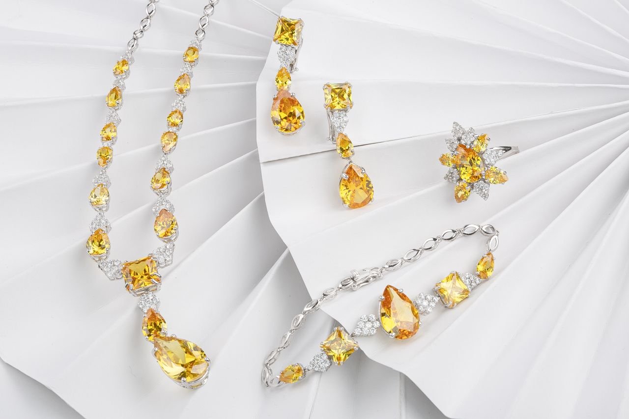 Necklaces A luxurious jewelry set featuring citrine and diamond pieces, elegantly displayed with a bright and sparkling aesthetic.