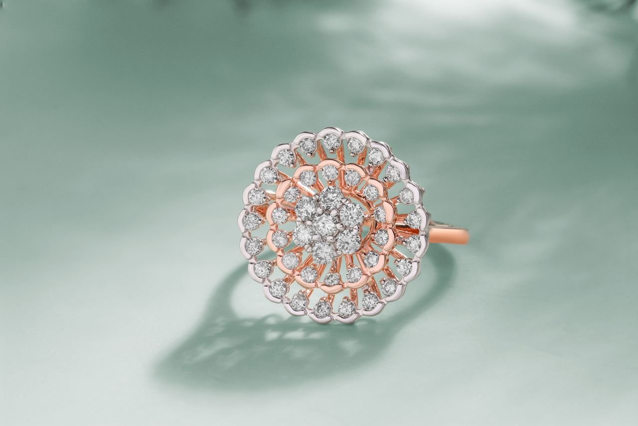 Cocktail Rings Elegant diamond ring with rose gold highlights on a mint green background for luxury fashion.